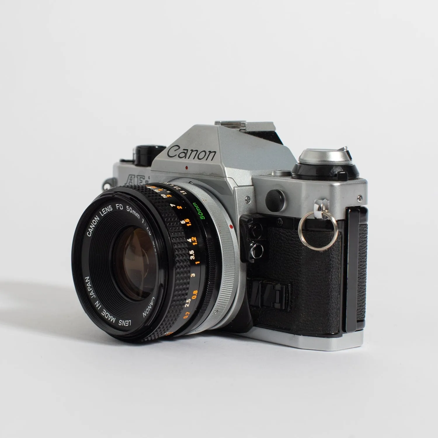 Canon AE-1 (35mm Kit) with 50mm f/1.8 and 70-150 mm lens