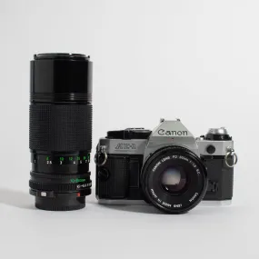 Canon AE-1 (35mm Kit) with 50mm f/1.8 and 70-150 mm lens